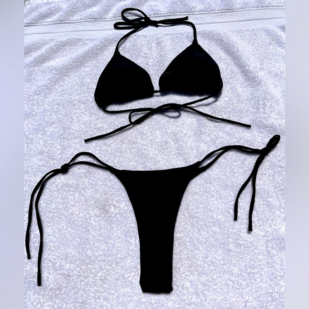 String Bikini Size L. Black String Tie bikini bottom and top.